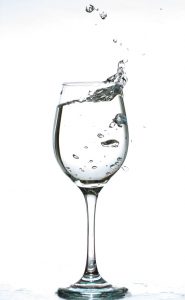 A whole House Water Filtration System will improve the clarity of your glasses