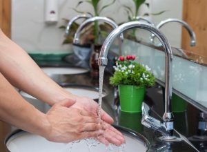 Treat Flagstaff Hard Water issues with H2O Concepts water treatment image shows hands being washed in sink